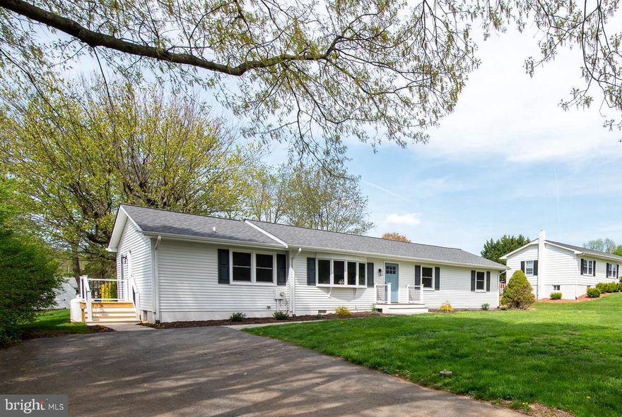 Spacious, 5 bedroom rancher has been totally remodeled through out and on the exterior too.  5 bedrooms on main level and 2.5 baths. Home has potential for in-law suite. Interior has hardwoods in living room, hallway and dining room. Kitchen has new white cabinets, Granite counters, stainless steel appliances and ceramic tile floor. New carpet in all the bedrooms. Bathrooms remodeled. Pella replacement windows. New architectural roof installed. New vinyl siding, gutters and downspouts. New exterior doors. Paver walk ways just installed leading to new front porch and side porch. New 16' x 12' deck off rear of home overlooking 36' x 18' inground pool. New , high efficiency Bosch heat pump installed. Private backyard. 2 car wide driveway with space for 4 cars. Almost 1600 sq. ft. on main level and sits on beautiful 1/2 acre lot. No homeowner's association. Like brand new! 10+++