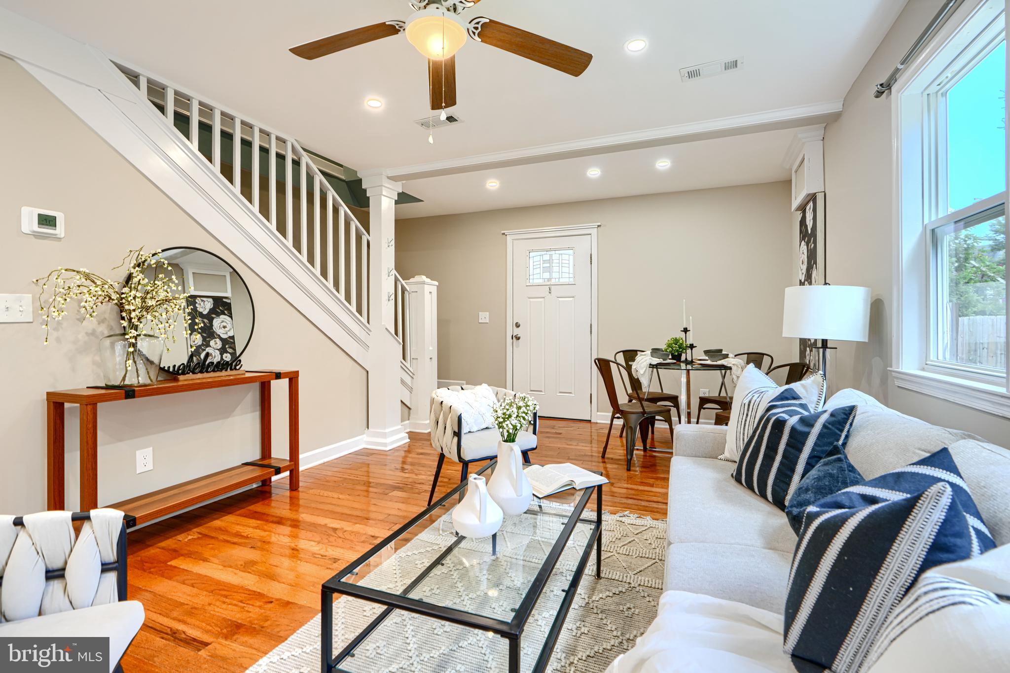 This charming home in historic downtown Centreville has 3 bedrooms and 2 full bathrooms, hardwood floors upon entry from your front porch into the living area, and luxury vinyl in the gorgeously updated kitchen outfitted with white shaker cabinets, granite countertops, newer LG stainless steel appliances and a large island that can accommodate stools for seating as well as a ton of extra cabinet space. There is a laundry area with full size washer and dryer. Downstairs also offers a first floor bedroom and full bathroom. Upstairs are two additional bedrooms and another full bathroom with closet. Notice the ceiling fans, recessed lighting, large moldings, beautiful staircase and the built-in shelving in the hallway upstairs - you will not be disappointed! Enjoy your covered front porch - fun to decorate for the seasons and small step out deck on back. The lot is small - no maintenace here - think condo without the fees. There are brand new dual-zone HVAC systems, spray foam insulation, new plumbing and electric. Easy, no maintenance living here -, nothing to do but move in. Public water and sewer. Walking distance to in town locations and businesses, as well as parks and schools. Eastern shore living in an adorable historic town - welcome to Centreville!