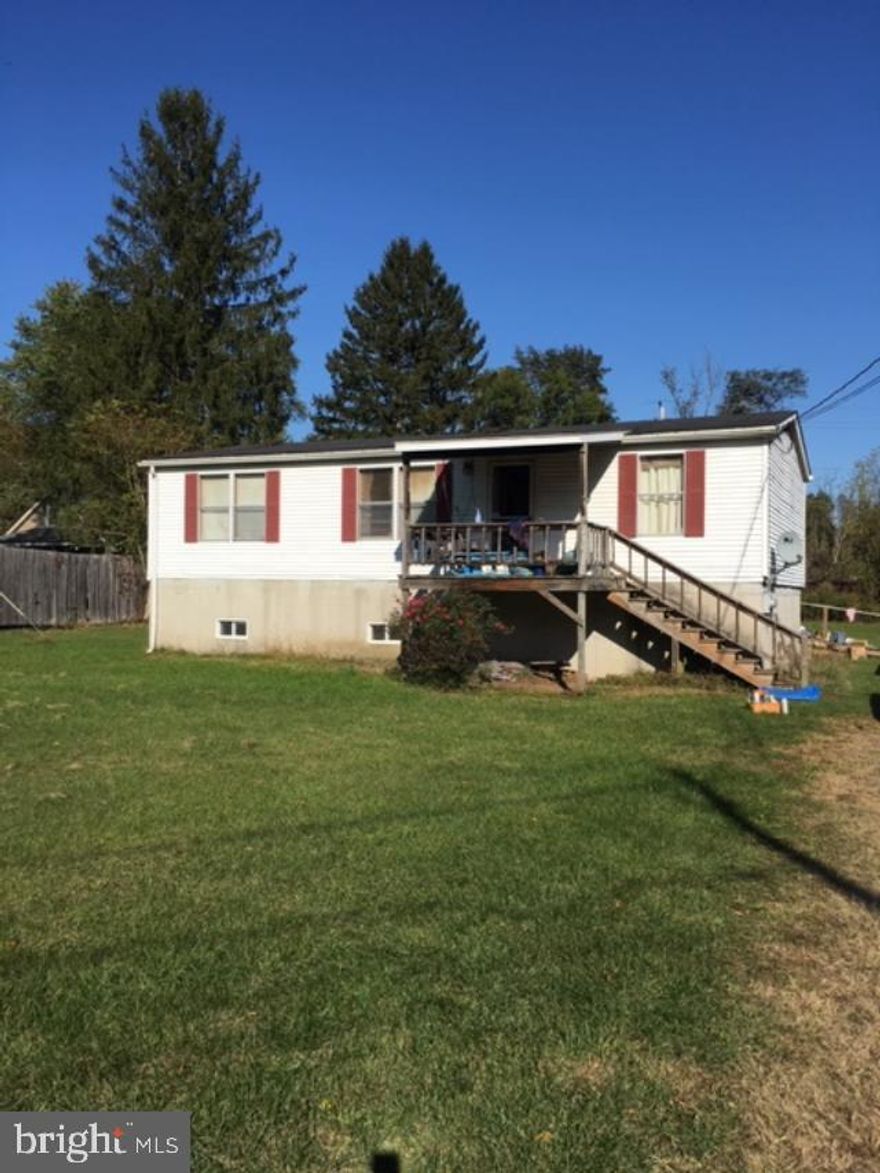 3 Bedroom, 2 bath Doublewide on level .68 acres. Sits back off of Derry Ave for privacy. Home needs some TLC.