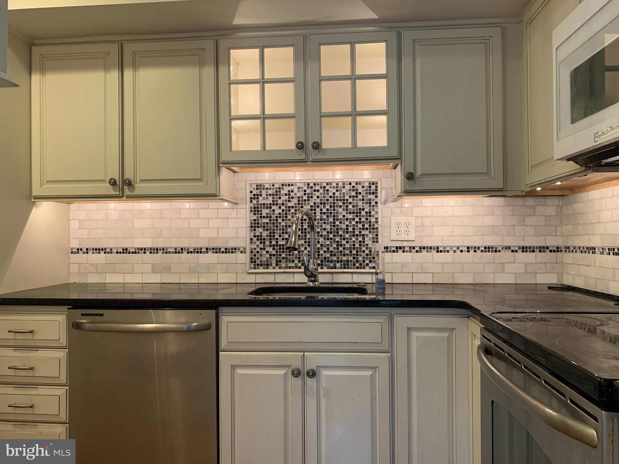 This well maintained 2 BD, 1.5 BA updated townhouse is conveniently located and walkable to Rosemont Train Station, Rosemont Square, Bryn Mawr Village, Ashbridge Park, and Petrie Ave. Park. The gleaming wood floors and neutral paint create an inviting atmosphere.The front entry welcomes you with storage in a generously sized coat closet. An updated kitchen has a tile backsplash, glass accents, granite counters, and stainless appliances. The Dining Room sliding glass doors allow light to filter in and access to outdoor living in the private fenced rear patio. Adjacent to the Dining room is the Living Room with a large window. Upstairs a spacious Primary Bedroom has a large walk-in closet featuring custom organizers and a nook just right for a desk or vanity. The 2nd Bedroom has a wall of closets and large window. The renovated Hall Bath has neutral tile flooring, glass-enclosed tub/shower, and a double vanity. A linen closet provides additional storage space. The finished basement has a large recreation room with wood-plank style tile flooring, 2 closets, plus a recently updated half bathroom. The laundry area is located in the large, unfinished utility/storage Room. Two parking spaces are available, one in a covered carport and one in the parking lot just across from the rear entrance to this home. Convenient walk-to-Bryn Mawr location Sought-after Radnor School District. Easy access to train stations, universities, hospitals, corporate centers, Blue Route, Turnpike, Center City, and Airport. * * First and last months. rent, plus security deposit necessary. No smoking & pets are case by case. No cats please. Tenant pays annual Radnor sewer fee and first $100 of repairs. This home is NOT approved for student housing, and Radnor Township zoning prohibits more than 2 unrelated people residing in a single family residence.