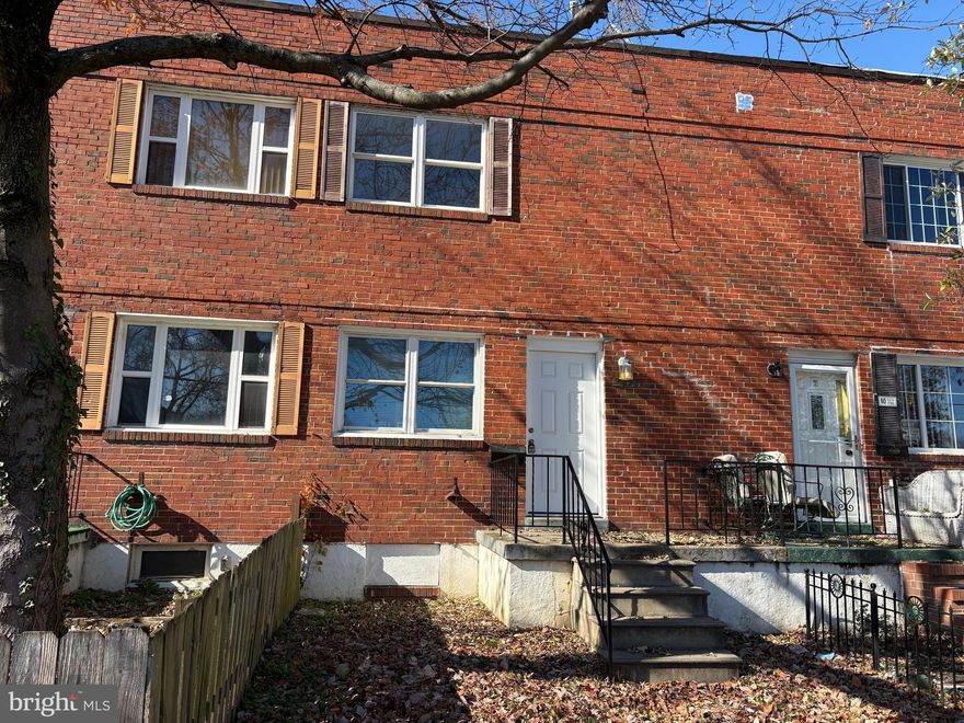 This beautifully renovated rowhome is ready for immediate occupancy.  It features newly refinished original hardwood floors, fresh paint throughout, a gorgeous updated kitchen with quartz counters and a breakfast bar and upstairs you'll find a newly renovated bathroom.  There is a large living room, dining room that opens to the kitchen and three bedrooms upstairs.  The unfinished basement is ideal for storage and has a laundry area with deep sink and walk-out steps to the backyard.  The backyard is fenced and in front is a large porch.  This is a great location in Brooklyn, you're across from a large church yard, there is ample street parking and you're only a block off Hanover Street for easy access.  Pets not preferred, but one dog under 30lbs might be permitted on a case by case basis with additional monthly rent of $40.00.  Minimum credit score is 640.