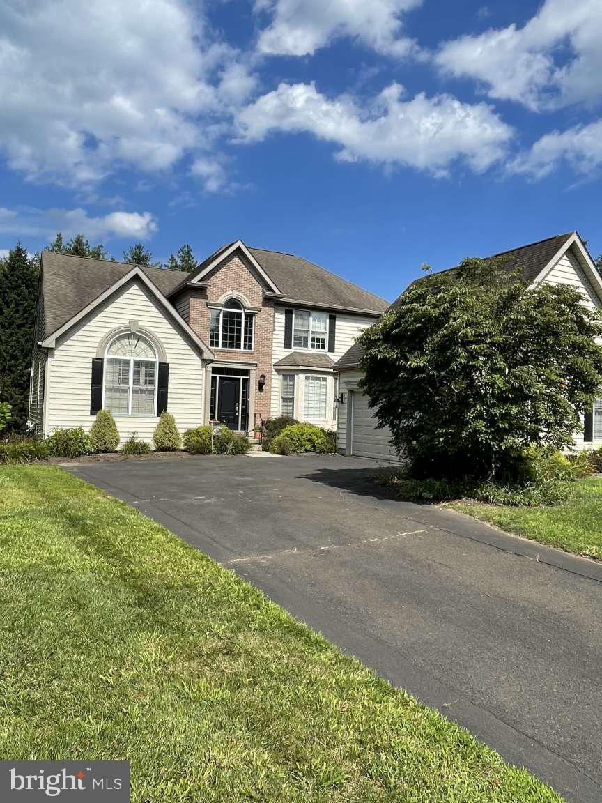 Nestled in the quaint 26 home community of the Orchards at Jericho located in bucolic Upper Makefield township and the Council Rock school district. Adjacent to Jericho National golf course and a few minutes from downtown New Hope and historic Washington Crossing. Easy access to NJ,NY and Philly. Low taxes and HOA fees. Community provides carefree living as HOA provides lawn care,trash service,septic field maintenance, and so much more. Community has abundant open space and is located between the two Upper Makefield parks with easy access to Brownsburg Park by way of the community walking trail. The two story foyer highlights the open layout adjacent to the formal dining room. Master Bedroom with vaulted ceiling is conveniently located on the first floor adjacent to the two story family room with full stone fireplace. Kitchen,breakfast room and laundry room complete the first floor along with a side entry garage which accesses the laundry room. The second floor offers a loft area overlooking the family room with two additional bedrooms and a bath. The lower level features a walkout basement with several windows and a 6 foot sliding glass door which accesses the backyard. This approximately 1,800 sf area offers plenty of bright space for an office,additional bedroom,game room or workout area. The home will have a new GAF timberline HDZ roof installed in early August. Schedule your private showing and experience this exceptional home firsthand.