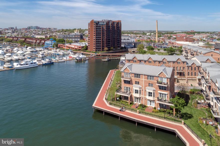 Come view this stunning, 4 BRM-3/2 bath waterfront townhome w/over 4200 sq ft and designed w/today's living style in mind and located in the gated community of The Moorings-Enjoy the spectacular sunsets and panoramic water views from each level-A custom "Cooks" kitchen w/a large center island w/granite ctop, exc cabinet storage & generous prep area-The remainder of the kitchen has SS appliances, multiple wood cabinets, 7 windows & marble flooring-A spacious MBRM suite w/vaulted ceiling, 2 sided gas FP, cherry wd flooring, bar area, balcony, awesome closet storage + a mas bath w/a glass & marble steam shower & jetted tub-A 2 car built-in garage w/add'tl 3 car parking in front if needed-Additional features: An elevator that stops on all 4 lvls; 3 gas FP's; glorious south & west views of harbor & city; 3 balconies & a brick patio; multiple heating & CAC zones; walk to bars & restaurants; backs to the promenade-Come see why the developer of this community picked this house for himself!!