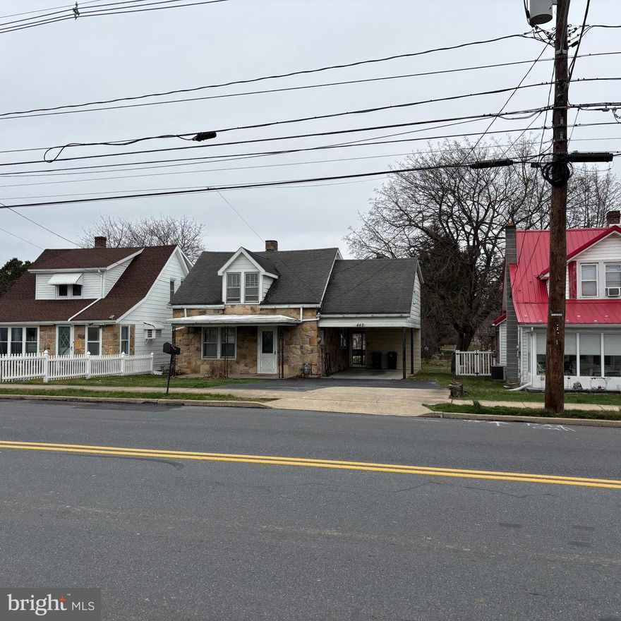 Stone cape cod home in the Borough of Chambersburg. Three bedrooms, one full and one-half bath, living room, kitchen and dining area. Covered front porch, rear deck, one -car carport and rarely used alley in the rear of the property for a second access. New gas furnace. Convenient location... close to Route 30, Interstate 81, shopping, schools, park, groceries and medical.