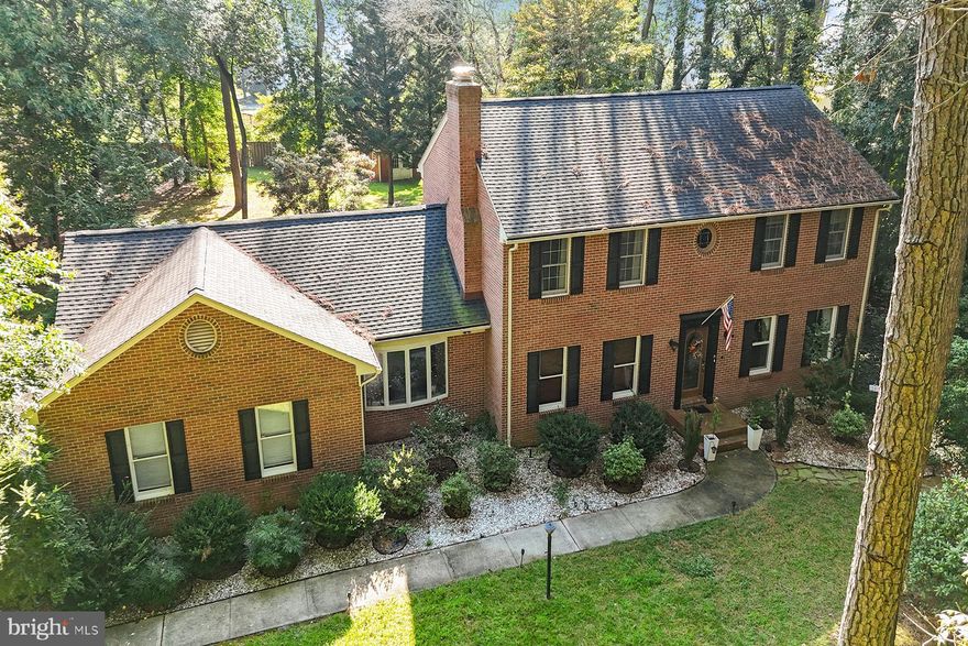 The BEST buy in the neighborhood! Welcome to 5437 Nithsdale Drive, ideally situated within one of Wicomico County’s most prestigious and sought-after communities, just moments from Salisbury’s premier shopping, dining, healthcare, and recreational offerings.  This stately 2 story Brick Colonial is nestled on a large (.72 acre) wooden lot, allowing you to enjoy the nature around you. Exuding both classical charm and practical updating (geothermal HVAC & newer roof (2019)), the malleable floor plan can be crafted to your liking. Upon entering the foyer you will find two rooms that can be utilized as a living room, office/study, traditional parlor room, formal dining, etc.. The kitchen boasts plenty of space, access to the spacious lanai, and effortlessly leads into what is currently being utilized as a formal living room. The remainder of the 1st level offers another large flex room, 1/2 bath, laundry area, and 2 car attached garage complete with workbench/storage shelves. Upstairs features both secondary bedrooms in addition to the prestigious primary bedroom. This owner's suite has it's own dedicated fireplace, luxurious ensuite bath, walk-in closet, and bonus room for additional storage. While the front yard features primarily mature trees, the backyard is a different story. Great for entertaining, it features include a large enclosed porch overlooking an expansive hardscape patio, open space, and Amish Built Shed. Nithsdale HOA provides a community boat ramp, playground, tennis, and basketball courts. Reach out with any questions or to schedule a private tour