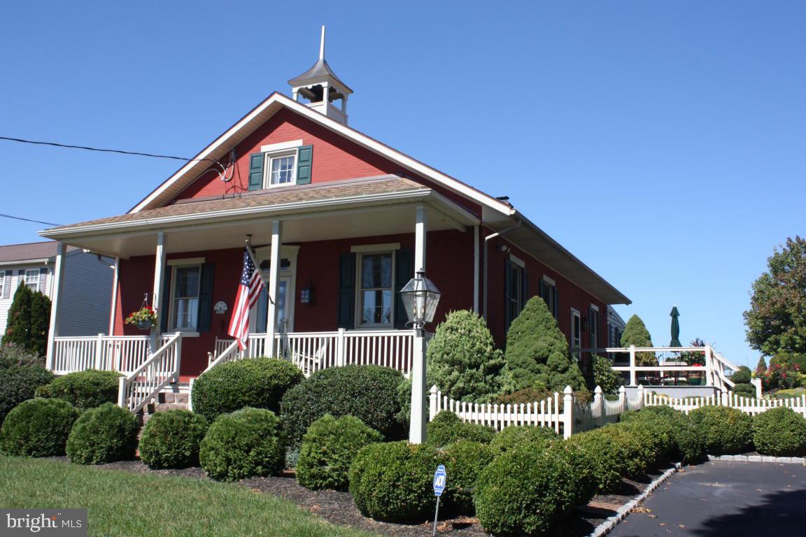 CHARACTER & CHARM to be enjoyed throughout property-Goodville School House renovated into 3 bdrm, 2 bth 1,860 sq ft home-Cstm cherry ktchn w/ceramic tile backsplash, breakfast bar, tile flooring-Beautiful LR & dining, spacious FR w/picture window view of rear yard-35x20 det. bldng used as antique shop w/heat & elec-Det. 42x22 grge w/21x15 finished game rm or workshop-Expansive landscape beds & fish pond-20x12 deck(trex)-20x12 garden shed-MUST SEE