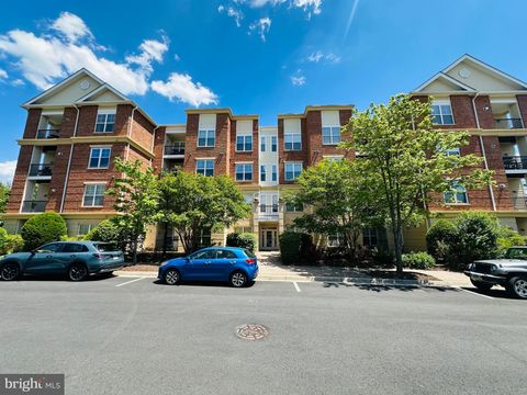 Photo of 815 Branch Drive #402, HERNDON, VA 20170 (MLS # VAFX2288426)
