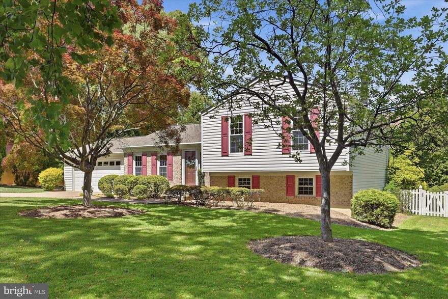 Welcome to this beautifully updated single-family home in the heart of Dunn Loring, where thoughtful upgrades and an open, inviting layout create the perfect place to call home. As you enter, you’re greeted by a bright open-concept main level, highlighted by hardwood floors and a stunning kitchen remodel completed in 2018, featuring new cabinetry, quartz countertops, a stylish backsplash, and recessed lighting. The living room, kitchen and dining area have a seamless flow filled with natural light, designed for both everyday living and entertaining. Step outside to the Trex deck, added in 2024, which leads to a fully fenced backyard, ideal for relaxing, hosting, or enjoying outdoor space in privacy. Upstairs, the spacious owner’s suite offers a walk-in closet and an attached full bath, while two additional generously sized bedrooms share a beautifully updated hallway bath renovated in 2019. The lower level provides even more living space with a large recreation room featuring a cozy wood-burning fireplace, a third full bath, and a walkout to the backyard. The fourth bedroom includes a Murphy bed, adding flexibility for guests and an attractive background for a home office. An additional lower-level area with LVP flooring offers the perfect space for a gym, playroom, or media room, along with almost 300 sqft of unfinished space for extra storage. Major updates include a tankless water heater (2021), radon mitigation system, gutter guards, French drains, and an irrigation system, all added in 2021 for peace of mind and efficiency. Ideally located just 10 minutes walk to the Dunn Loring metro stop and 5 minutes drive to Route 7/I-66/I-495. Shopping and dining at the Mosaic District, Vienna and Tyson's are all within 10 minutes. And the property sits within the top-rated Stenwood/Marshall/Thoreau school pyramid. This move-in ready home truly has it all. Don’t miss your opportunity to make it yours! Photos may be virtually staged