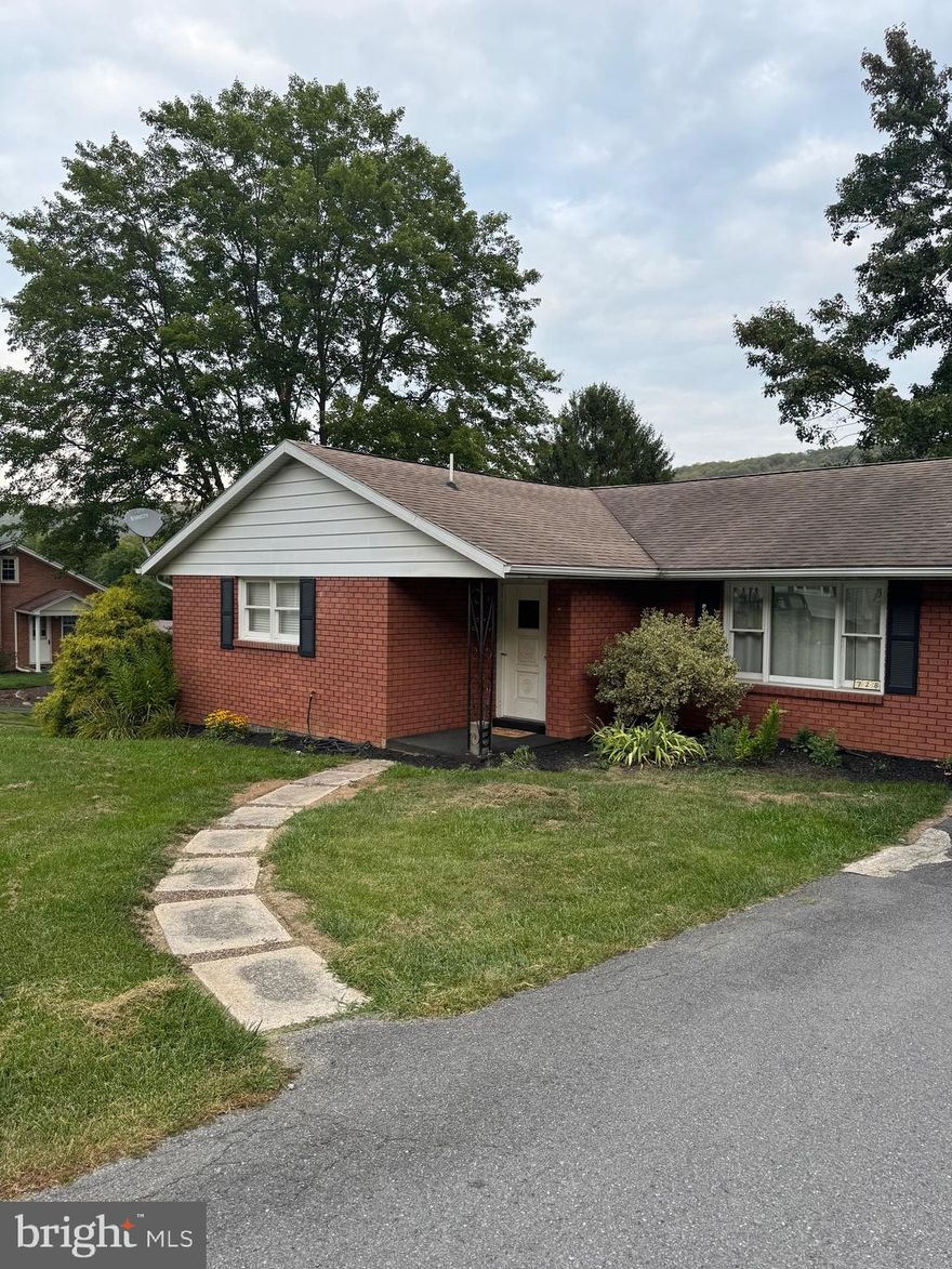 Welcome to your new home at 728 Lavale Terrace. This beautiful brick ranch home features 3 bedrooms, 1 and a half bathrooms and a fully finished basement with garage access. It has central air for the summer and a fireplace to make it extra cozy in the winter. It is located in a desirable neighborhood in Lavale, close to all the amenities including walking distance to the new library.  It has off street parking with driveway spaces and carport that leads to the kitchen plus a one car garage. It has a large backyard with a firepit.