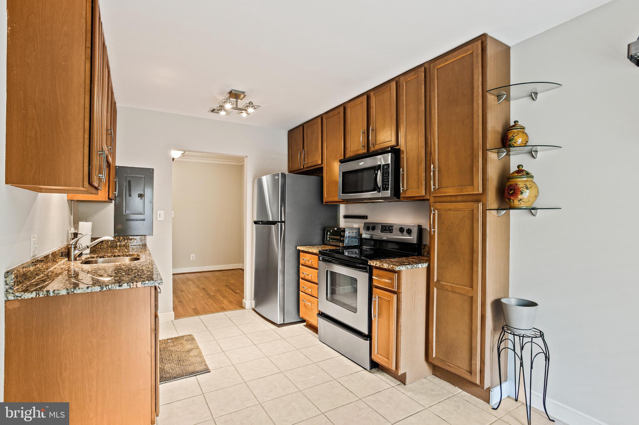 Take advantage of this price reduction and move in today! This beautiful garden-style 2-bedroom, 2-bathroom condo is located on the top floor of a charming 4-story building, offering privacy and serene treetop views. The open-concept layout is filled with natural light, featuring a spacious living area, modern kitchen, and private balcony perfect for morning coffee or evening relaxation. Both bedrooms are generously sized, with the primary suite offering an en-suite bathroom and walk-in closet. Enjoy the peaceful ambiance of garden-style living with the convenience of top-floor tranquility. The pool during the summer months and easy access to the Rec center directly across the street are great amenities to have.