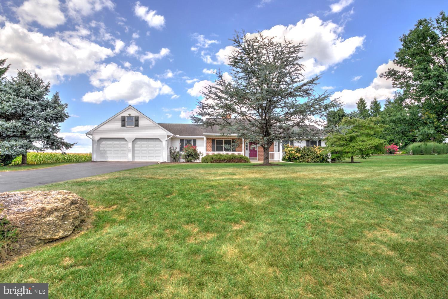 4 BR / 2.5 BA home located in the heart of the countryside in Donegal School District! With miles of corn behind the property, you'll enjoy peace and quiet on this beautiful 1/2 acre property! Inside you'll find a refreshed home with fresh paint, new carpet and beautiful LVP flooring in the living room. With over 1,800 SF of first floor living, this home has 4 nicely sized bedrooms (including a primary ensuite), convenient first floor laundry, central air, and a nice deck overlooking the private backyard and farmland. Enjoy the oversized 2 car garage for all your projects! Other features include some new replacement windows, brand new stainless steel appliances new lighting/plumbing fixtures throughout.
