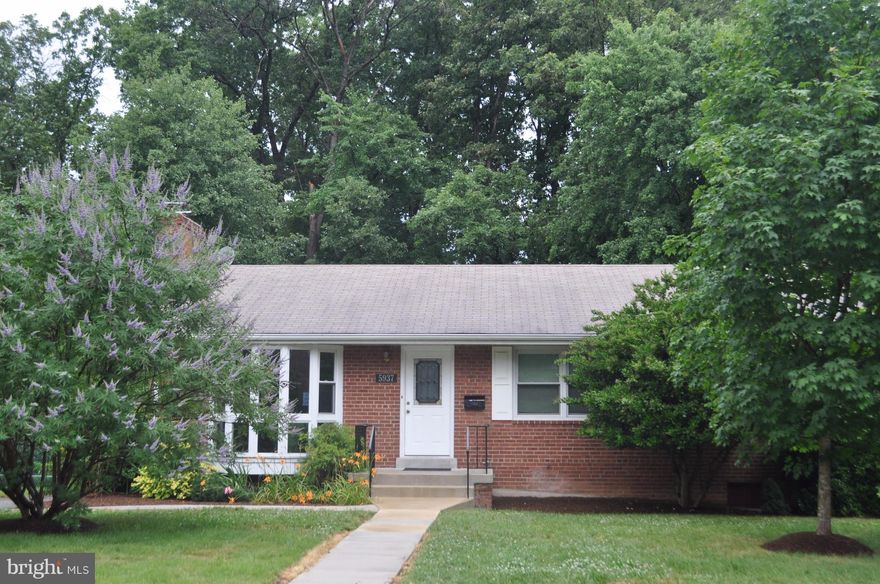 Lovely rambler on quite street. Stunning new Kitchen! Living Rm w bow windows & wood frplc adjoins Dining Rm. 3 Bedrms, bath & lots of closets on main lvl. Walkout lower lvl w huge rec rm, two bdrm, bath, laundry room & ample storage space. Hardwd, newer carpet, updtd baths & lights. Peaceful setting to enjoy deck & large backyard. Available immediately. Minimum qualifying income is $112,500