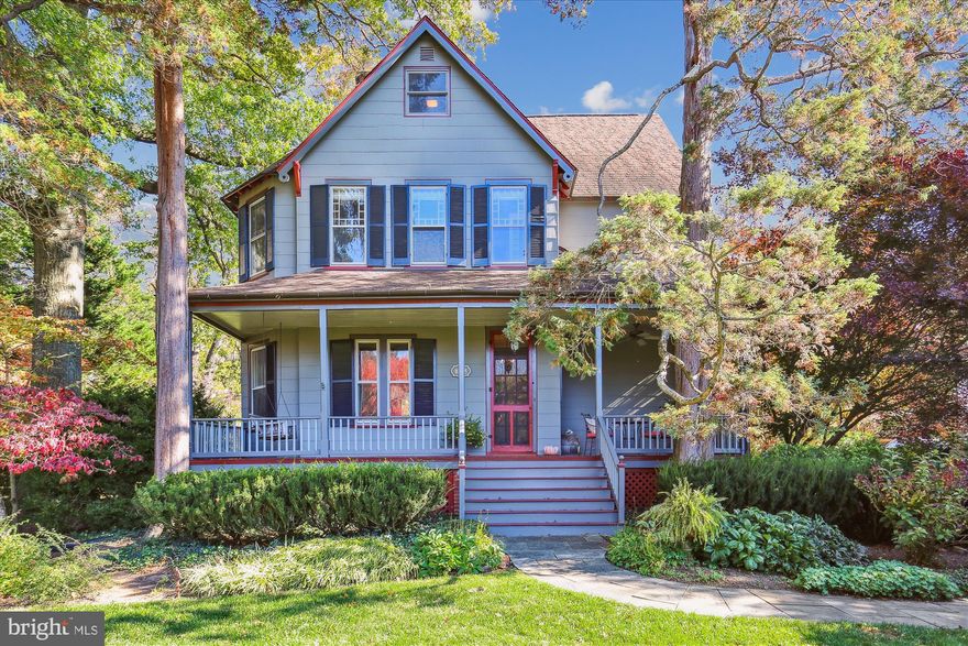 New Price and Newly Staged Come Take Another Look at This Incredible Property! Welcome to the stately charm of this expanded Farmhouse beauty, graced with a welcoming front porch and situated on a spectacular 20,501 square foot lot in the highly sought-after. Originally built circa 1888, this elegant home showcases timeless character with gorgeous oak floors, exquisite millwork, and enchanting architectural details.

As one of the first homes built in Garrett Park, this distinctive residence is ideally located near the tennis courts and the town center. The inviting front porch sets the tone as you enter the home through a handsome “L” shaped entry foyer. Inside, discover a formal living room with a dual-sided fireplace and pocket doors. The living room seamlessly transitions to an elegant dining room with custom built-ins, another dual-sided fireplace, and access to a side porch.

The renovated chef’s kitchen is a culinary delight, featuring Soapstone granite counters, a Heartland gas range with six burners and a Copper exhaust hood, a farm sink, stamped tin ceilings, pendant lighting, a built-in wine rack, display shelving, and glass front cabinetry. Adjacent to the kitchen is a sun-filled breakfast room with picturesque views and access to the rear wrap-around porch.

In 2004, the property was expanded with a two-level addition, introducing a sun-drenched family room with a fireplace, a built-in reading bench, and access to the rear porch via French doors. The main level is complete with a powder room, a laundry closet, and a built-in sound system in the kitchen and family room.

The second level boasts three bedrooms, two updated full bathrooms, and a lovely primary bedroom suite with a beautifully appointed bathroom and an office nook. The top-level features two enchanting bedrooms, a full bathroom, and a bonus sitting room/office. The unfinished lower level provides copious storage space and a workbench area.

Outside, the remarkable expansive yard (31,195 sq ft combined) is adorned with beautiful mature landscaping, a brick potting shed, a front porch, two side porches, a rear attached octagon gazebo, and a delightful stone patio. A private gravel driveway offers ample room for multiple cars.

Nestled in the heart of the Town of Garrett Park, known for its close-knit community and independent spirit, this extraordinary property is conveniently located blocks away from the MARC Train, Strathmore, Grosvenor Metro, Pike and Rose, and Whole Foods.



160403420346 tax record lot size: 20,510 sq ft (this lot has the home)