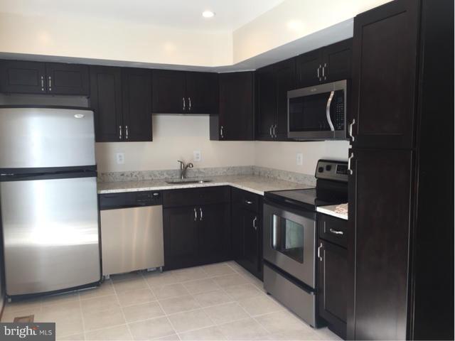 Nicely renovated 3 lvl, 3 bdrm, 2FB and 2HB TH in conveniently located Gaithersburg. Minutes from major commuter routes. Granite cntps, SS appl. new cabinets and tile flrs in kitchen. All baths have been updated,new carpet, wood flrs in LRDR. Sliders off kitchen to deck with a walk down to fenced rear yard. Large functional laundry room! A great place to call home for a while. A must see!!
