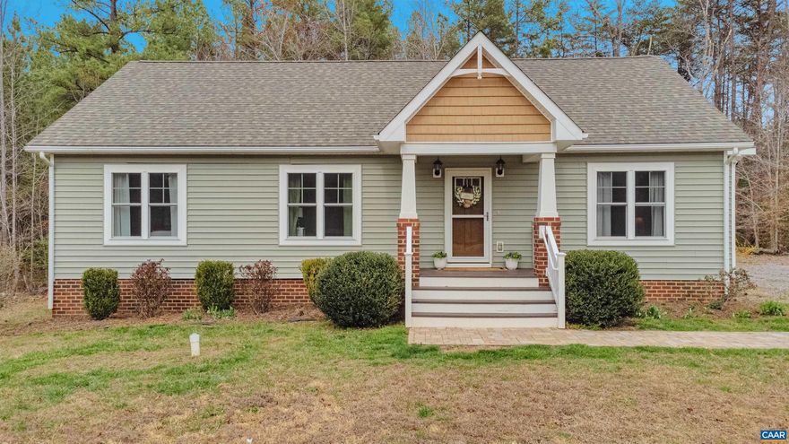 Welcome to 340 Manchester Road in Bumpass, Virginia! Escape to the peaceful countryside in this adorable ranch-style home featuring 3 bedrooms and 2 full bathrooms. The inviting living room boasts vaulted ceilings and a cozy gas fireplace, creating the perfect space to relax or entertain.  The eat-in kitchen offers beautiful cabinetry and granite countertops, providing both style and functionality for everyday living. A separate laundry room adds extra convenience.  All three bedrooms are generously sized, including a comfortable primary suite with a walk-in closet and a private bath featuring double vanities.  Enjoy the tranquility of country living while still being conveniently located?just 25 minutes to Short Pump and about 40 minutes to Charlottesville for shopping, dining, and entertainment.  If you?re looking for quiet country living with modern comforts and easy access to nearby amenities, this charming home is the perfect place to call home. Firefly Fiber Internet is available!!,Wood Cabinets,Fireplace in Living Room