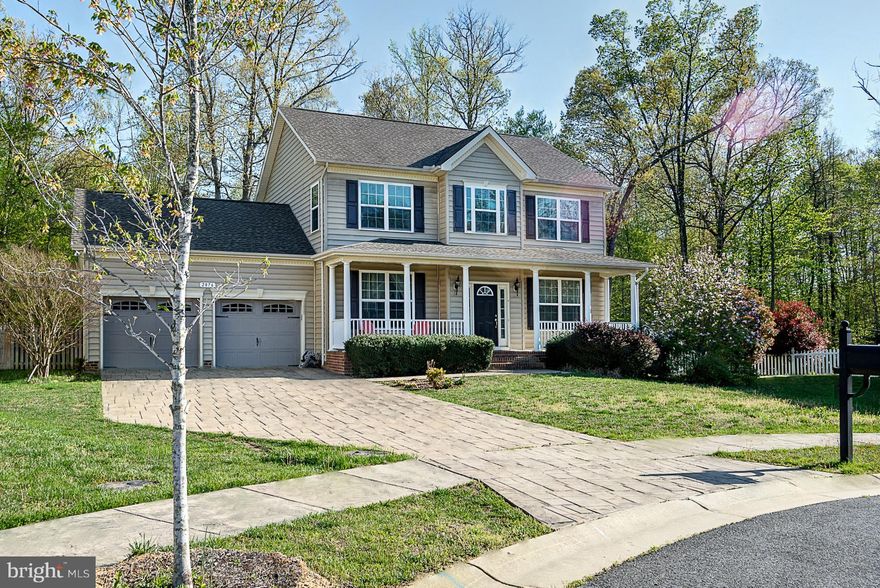 Gorgeous 4BR 3.5FB home on cul-de-sac w/fully finished basement and 2 car garage. Gourmet kitchen features center island w/granite tops, microwave, wall oven, gas cook top and table space.  Sep dining rm. Family rm w/gas FP.  Extra room for home office, den... you decide. Basement w/huge rec room and bedroom w/full bath. Fully fenced rear yard backs to wooded privacy. Yard irrigation system.