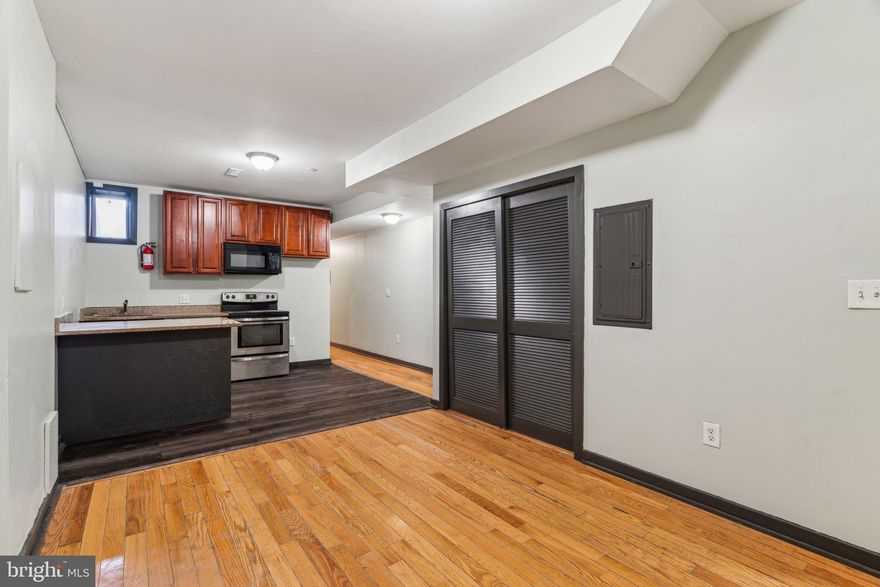 Discover the charm of Unit A at 1930 North Gratz Street. This spacious bi-level unit features six large bedrooms and two and a half baths. The first floor offers two bedrooms and a full bath, while the second floor includes four bedrooms and one and a half baths. Enjoy modern amenities like granite countertops, elegant hardwood floors, central AC, and in-unit laundry. With a private backyard space, this unit combines comfort and convenience in a refreshed, modern setting.