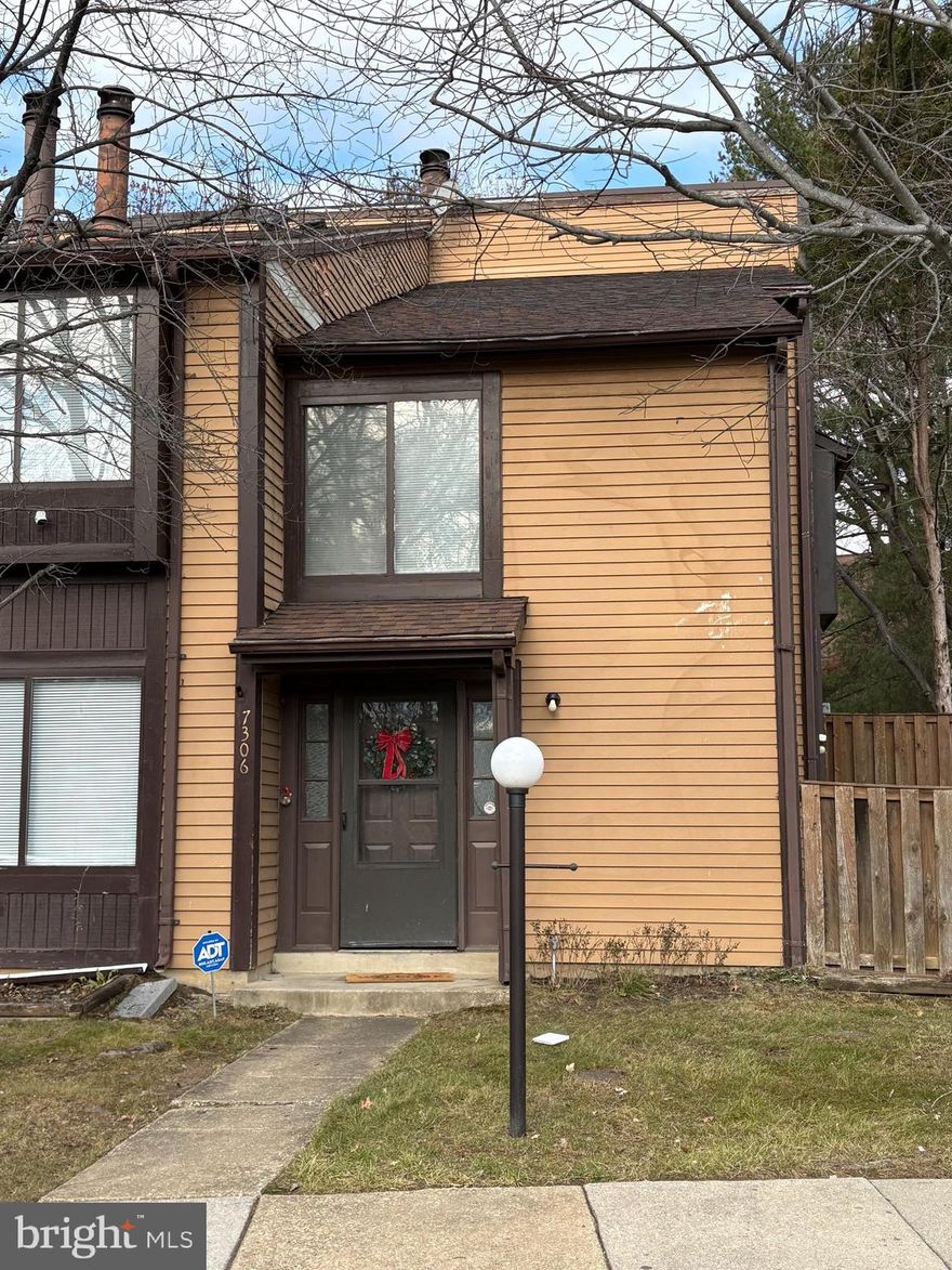 Beautiful end-unit townhouse in the sought-after Stonewood community. COMPLETED IN 2022--NEW ROOF, NEW KITCHEN, NEW STAINLESS STEEL APPLIANCES, NEW LVP WOOD FLOORING, NEW CARPET, NEW BATHROOMS, NEW LIGHT FIXTURES THROUGHOUT, NEW INTERIOR DOORS. HVAC System replaced in 2022 with 5 yr warranty. WASHER/DRYER replaced in 2023. This cozy home features a spacious 2-story entry, open living space, recessed lighting, a wood burning fireplace, LVP flooring on the main level, and carpet on the upper level.  It features high ceilings and the large windows invite in lots of natural light. The gourmet kitchen boasts quartz countertops, tile backsplash, modern white cabinetry, and stainless steel appliances. Walk out the sliding glass door from the kitchen and exit to a fully fenced private backyard with a large deck and a storage shed. The main level incudes the living room, dining room, kitchen, half bathroom room, and laundry area.  2 large bedrooms, each with ample closet space, and 2 bathrooms complete the upper level.  The primary bedroom has an en-suite bathroom. Very reasonable HOA fee of $79/month includes common area maintenance, snow removal, off-street parking, and a tot-lot. This is an ideal location, commuter friendly and readily accessible to all major roadways and shopping areas. Come make this warm and welcoming home yours. Perfect starter home for 1st time home-buyers or excellent rental property. Don't let this one slip away!