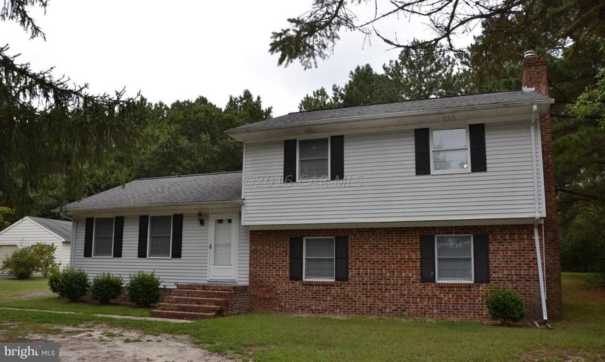 Lots of potential 4 bedroom split level, convenient location.