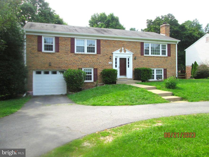 Hardwood floors throughout main level. Freshly painted, new over the stove microwave, brand new carpet and garage door. Newer granite counter tops, vanities and fixtures, fireplace on lower level. Fenced back yard, half circle convenient driveway, one car garage . Easy hop on the bus to Huntington Metro. A short walk along a path will take you to Mt. Vernon and the GW Parkway plus popular bike path along the Potomac river. Only 5 minutes to Fort Belvoir.