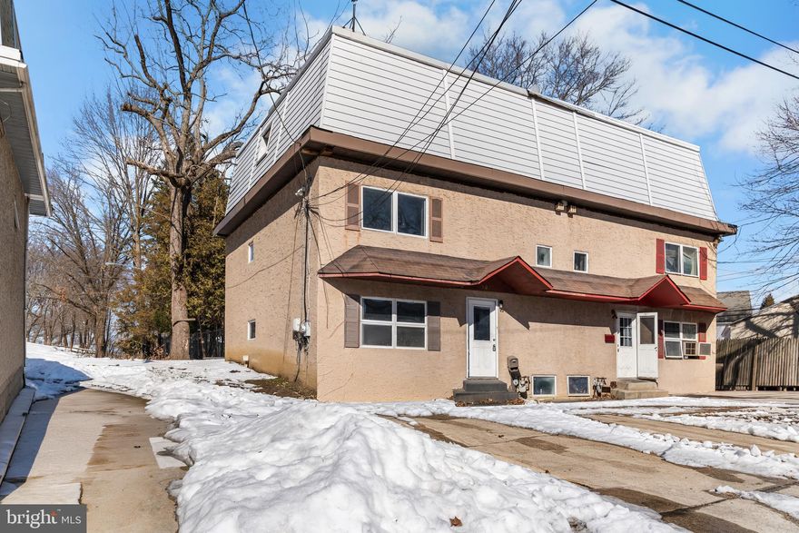 Located in the heart of Morton, Delaware County, this spacious twin home offers four levels of versatile living space, including a finished basement and three floors above grade. The main level features an open layout with a comfortable living room, dining area, and galley-style kitchen, creating a welcoming space for everyday living and entertaining. The finished basement adds valuable flexibility with recreation space, storage, and a full bathroom. The second floor includes two bedrooms connected by a full hallway bath, while the third floor offers a private bedroom, an additional full bathroom, and access to a rooftop deck with scenic views. A two-car concrete driveway provides convenient off-street parking, and the end-of-street location creates a semi–cul-de-sac feel. Backing to open space and ideally situated near major routes including I-95, I-76, and I-676, as well as Philadelphia International Airport, this home combines space, convenience, and location.