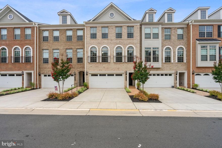 Follow tour links for 3D Walkthrough!

Welcome to this pristine 3-bedroom, 4.5-bathroom townhome, built in 2021, nestled in the highly sought-after Lake Manassas Turtle Point community. Barely lived in, this home is like new construction, offering modern luxury and serene living with a private lot backing to picturesque woods. The home features a convenient 2-car garage and top-of-the-line finishes for the flooring throughout, adding elegance and sophistication.

Enjoy the expansive open floor plan with 3,409 finished sqft, perfect for entertaining and everyday living. The gourmet kitchen boasts high-end stainless steel appliances, a giant island, beautiful bright Quartz countertops, and ample cabinet space. The main level and master suite both feature balconies overlooking the backyard, providing peaceful outdoor spaces.

The spacious master suite includes a walk-in closet and a spa-like en-suite bathroom with dual granite vanities, a soaking tub, and a separate shower. In addition to the master suite, there are 2 generously-sized bedrooms, each with its own full bathroom. The basement offers a versatile recreation room with a full bath, ideal for an office, gym, playroom, or guest suite.

Lake Manassas Turtle Point offers a wealth of amenities including walking trails, a swimming pool, tennis courts, and a clubhouse. Conveniently located near shopping, dining, top-rated schools, and major commuter routes, this townhome provides modern living in a private, and natural setting. Don't miss the opportunity to make this stunning property your new home!