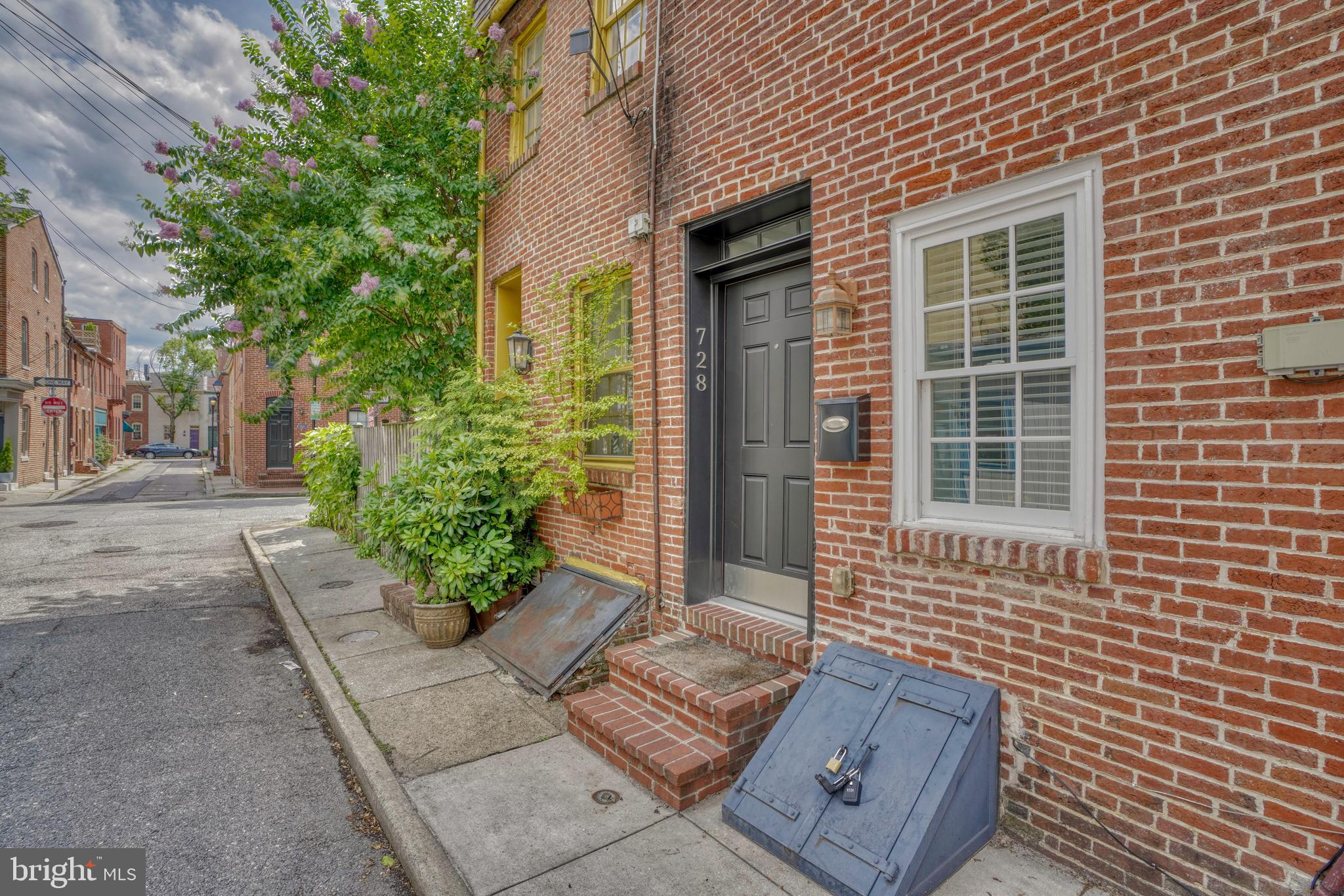 BACK ON THE MARKET! BUYER GOT COLD FEET APPRAISED VALUE 270K!!! Quintessential Fells Point charm meets modern living in this simply adorable 2 bed 2 bath home. Located in the heart of our favorite Biltmore neighborhood you'll love being nestled away on cozy Bethel St while only steps away from some of the best restaurants and shopping in town! This home has been mindfully updated with a new roof, top of the line appliances, modern bath renovations, energy efficient ductless mini splits, and more! This home is the perfect place for the city lover on a modest budget or the savvy investor looking to add to their rental portfolio. Walk to Hopkins, Harbor East, Canton, and downtown, easy commuter access to 83 and steps to the water taxi. Come see why we call it CHARM CITY!