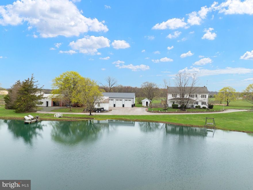 Welcome to this one-of-a-kind 2,400 sq. ft. farmhouse nestled on 20.3 acres in Clean & Green, just minutes from Historic Gettysburg! This unique property blends history and functionality with multiple sections of the home dating back to 1796, 1835, 1942, and 1976—featuring charming exposed log construction (now covered), a spacious 2nd floor addition, and timeless character throughout.
Inside, the main level boasts a large kitchen and dining area, cozy family room with pellet stove, office space, and a full bathroom. Upstairs offers 4 generous bedrooms, a loft area, walk-in closet, and another full bath. The floored attic provides excellent storage, and the large covered front porch is perfect for enjoying peaceful countryside views.
Equestrian lovers will appreciate the well-equipped horse facilities, including a 120x120 riding arena, 7 stalls, tack room, 2 fenced pastures (12 acres total), electric fencing, a run-in shed, and boarding setup. Additional outbuildings include a smokehouse, outdoor fireplace, and a massive 48x40 three-bay garage with 10’ doors and 12’ ceilings—ideal for RVs, farm equipment, or workshop space.
Relax by the private pond or explore the open acreage—this rare find offers the perfect balance of rustic charm, modern comfort, and outdoor lifestyle. Don’t miss your opportunity to own a slice of Pennsylvania history!