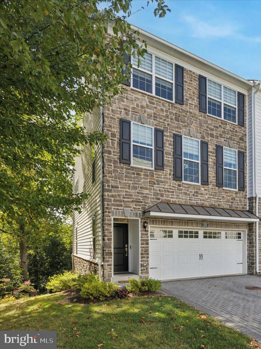 Step into luxury end unit carriage style Toll Brothers Townhouse at 213 Corvus Circle, Media, PA, where modern elegance meets comfort in the coveted Ravenscliff community. This exquisite townhome offers 3 bedrooms and a well-appointed layout featuring 2 full bathrooms and 2 half bathrooms, spanning 2,796 square feet. Not including the basement walkout area.
Upon entering, you are welcomed by an airy living space that seamlessly combines contemporary design and comfort, enhanced by 2 zones of central air for optimal year-round efficiency. The gourmet kitchen, located on the second floor, offers stunning views of the surrounding wooded area, creating an idyllic setting for both intimate gatherings and grand entertaining. You can also enjoy the wooded private view from one of the two decks.
The master suite, located on the third level, is a private retreat featuring a spacious walk-in closet and a luxurious ensuite bathroom complete with dual vanities and an oversized shower. Each room is bathed in natural light, ensuring a serene and inviting atmosphere.
Further enhancing the home's appeal is a finished recreation room on the first level, perfect for relaxing or a home office. The property also includes a front-access two car garage and additional driveway parking, providing convenience for residents and guests alike.
Security features are integrated throughout, offering peace of mind, while the elegant and modern amenities set a new standard for suburban living. This property is a harmonious blend of sophistication and functionality, making it an ideal choice for discerning buyers seeking quality and comfort.

If the home itself isn’t enough its location in Media is. Just a short distance from “Dining Under the Stars”, Rosetree Park concerts, and a 15 minute drive to the airport if your time off takes you somewhere special. All in an award winning top school district. What’s not to LOVE.