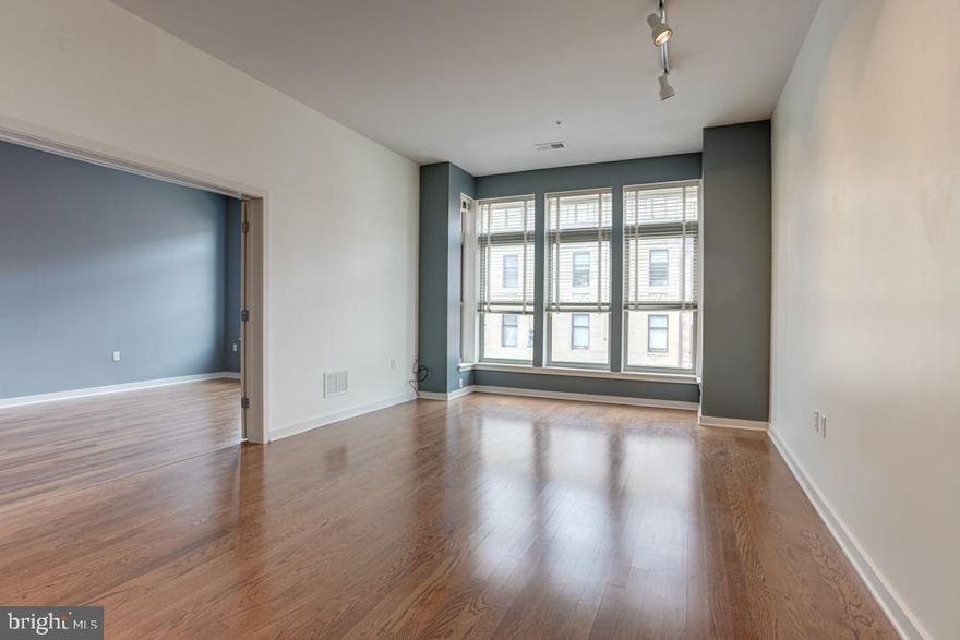 Welcome to sensational city living at 1209 North Charles Street #209, nestled in the heart of Mount Vernon Neighborhood, Downtown Baltimore! This chic 973 sq ft, 1-bed, 1-bath condo offers an open-plan living space brimming with natural light and fantastic high ceilings that bring a sense of airiness and scale.
The superb living space boasts upgraded hardwood flooring throughout, injecting a touch of elegance to this upscale dwelling. The gourmet kitchen, graced with stainless appliances and luxurious granite counters, invites you to explore your culinary prowess.
Amidst the hustle and bustle, enjoy the convenience of an in-unit washer/dryer along with the security of a deeded parking space 17A—all included! The building further extends comfort and lifestyle amenities including a charming courtyard, state-of-the-art gym, protected garage, and an Amazon Package Digital Locker for secure deliveries.
Hungry or looking for entertainment? A plethora of vibrant restaurants and bars are just a stone's throw away. Perfect for city-dwellers, access to I83 and Penn Station is straightforward—making commuting a breeze.
Experience this wonderful condo and discover your perfect urban retreat. Don't wait! Contact today to schedule a showing and witness this fantastic offering first-hand.