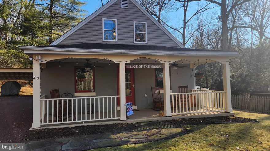 Welcome "Edge of the Woods".   Nestled in the Stoberdale area of Mt Gretna, this property offers access to the 1100-acre Governor Dick Park from your front door.   This home has been lovingly remodeled in 2017.  New roof, windows, wiring and breaker panel, insulation, drywall and ceilings.     Relax on your front porch, side deck or rear porch and enjoy the surrounding nature.
This home offers a spacious living room with propane wood stove, a large kitchen equipped with newer appliances and an island, a first-floor bedroom with plenty of natural light and full bath with a walk-in shower. 
The 1st floor also contains a convenient laundry and mudroom/storage area with access to the carport.    
The second floor has two spacious bedrooms and a full bath with shower.     There is extra storage in the eaves and a large hall closet.
You will be amazed by all the off street parking and the 3 space carport offers covered parking as well.