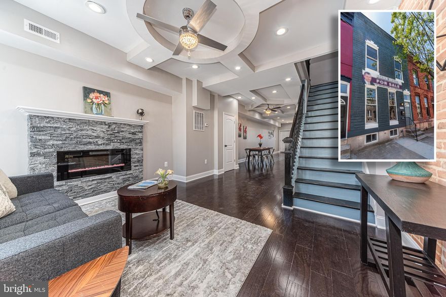 BEAUTIFULLY DESIGNED RENOVATION WITH 3 FINISHED LEVELS!  Main level with a spacious living room w/ an electric fireplace, half bath, and gourmet kitchen with granite counters, ss appliances, & designer tile backsplash, upper level with a Primary bedroom suite with a full bath and 2 additional bedrooms with a hall bath, fully finished basement with a large family room, bedroom and 3rd full bath, and a rear deck & private patio that's perfect for entertaining!  Available grants include 5k Community Development Block Grant & 5K Live Near Your Work great - perfect opportunity to take advantage and help with down payment and closing costs.