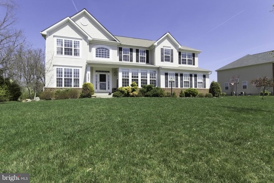 15K PRICE IMPROVEMENT! 4Br, 4.5Ba, w/ over 5000 sf on 3 fin lvls! .63 acre lot next door to wooded lot providing privacy. HW & tile on main lvl, main lvl office, gourmet kit - center island w/ seating, gas range, granite & breakfast area. TREX deck & HUGE backyd.  Lg MBR w/tray ceiling, W/I closet & lux bath w/ dbl vanities. UL loft/bonus rm. Fin walk-up LL w/ 2 rec rms, exer rm, den & full bath.