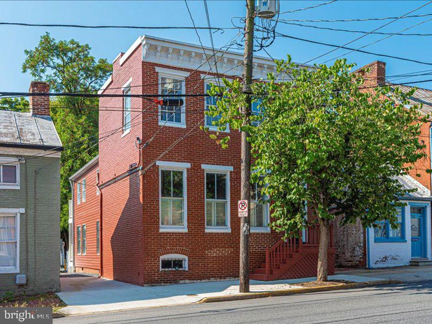 2,004 SF Professional Office Building, Free Parking in Rear. First Floor has two offices, reception area, conference room, work room and half bath. Second Floor has three offices and another half bath.   
Recent upgrades include Metal Roofing on back portion of Roof, Water Heater, 
ADA Bathrooms and Chair Lift, Heat Pump, Weed Resistant Gravel Parking Lot, Sealant Coating on Basement Walls, Partial Basement Concrete Flooring, HVAC with Central Air Conditioning.

Walk to City Hall, Courthouse, Restaurants & Shops.  Great Visibility - Zoned DB - Downtown Business