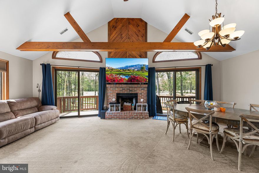 Welcome to 8 Chelsea Court in Ocean Pines, a beautifully maintained Chalet-style home perfectly situated on a golf course cul-de-sac in the heart of Ocean Pines. This resort-style community offers a lifestyle unlike any other, and this property takes full advantage of nearby access to some of the top sought-after amenities. Inside, you’ll find two finished levels of comfortable living space and an open 2nd story beamed ceiling, sold fully furnished for a true turn-key experience. The property features a 1-car attached garage plus an additional 2-car detached garage: ideal for cars, golf carts, or extra storag, as well as generous driveway parking. The owner has added an additional hvac system so there are now 2 zoned systems for better interior temperature control. Step outside to enjoy the vinyl-fenced yard with plenty of space for entertaining. Relax on the expansive wrap-around double-level decks or take in peaceful views of the pines, golf course and fenced-in manicured lawn.

Chelsea Ct, off of Ocean Parkway is located just across from Pintail Park (take out your kayak), this home combines a unique setting with convenience and endless recreation. Whether as a primary residence, vacation retreat, or investment, this property is a rare find in one of Ocean Pines’ Seabright section.
Check ocean pines association website for an accurate listing of the memberships available for the Resort amenities, golf course access, swimming pools, beach club and more. Listing has one of the membership recreation fee estimates. Other options are available.