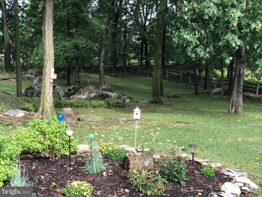 Bring your Horse, your chickens, NO HOA on this beautifully maintained brick rancher. The house has real hardwood floors throughout, stainless steel appliances, a working wood fireplace. The current owners have done a great job improving this property, from the park like landscaping of 1.98 acres to all new plumbing. With a full basement with rough in plumbing ready for you to turn it to extra living space. This one is a must see and will not last long.