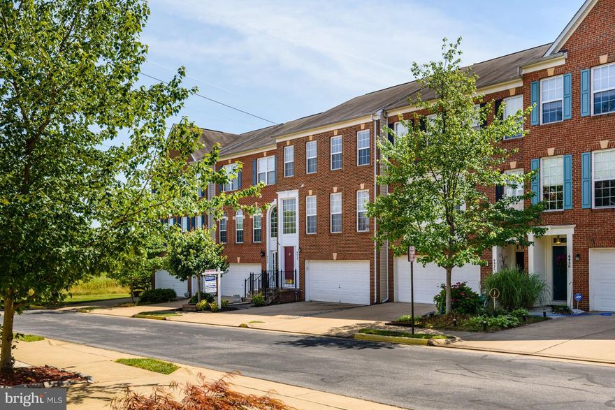 REDUCE PRICE! Living is easy in this impressive, generously spacious residence.  The open floor plan encompasses 3 spacious bedrooms with lots of room for study, sleep and storage; 3 1/2 bathrooms, a stylish gourmet eat-in kitchen that flows to the family room graced by a fireplace. Enjoy gatherings in the generously-sized living/dining area.  Close to Metro, great shops, restaurants minutes away.