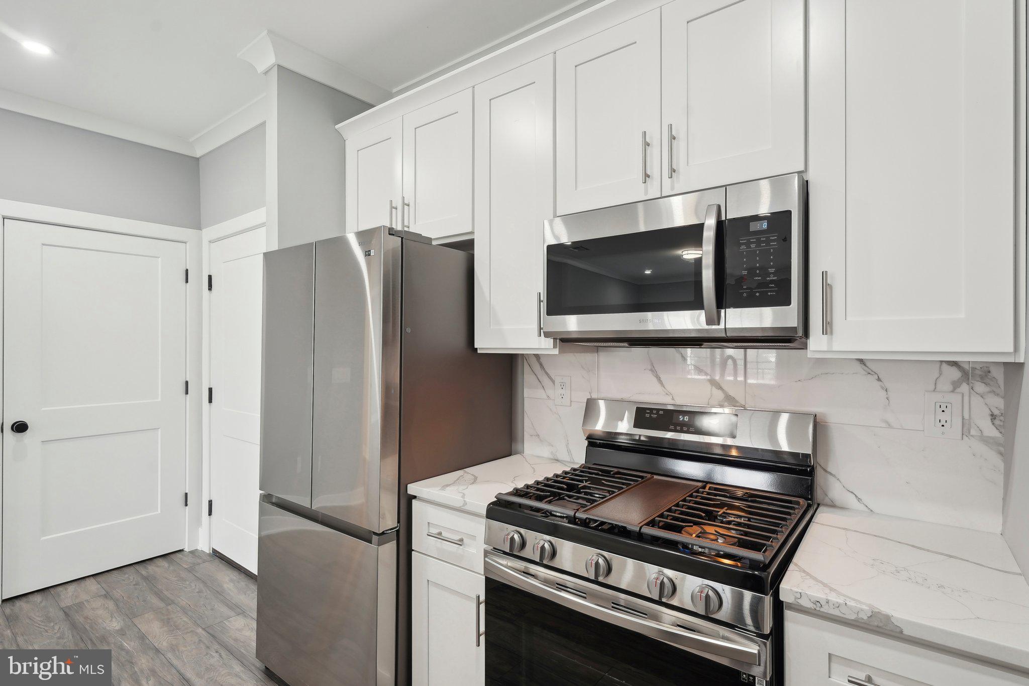 Nestled at 2421 Bristol Road in the heart of Warrington, Pennsylvania, The Warrington Place is a thoughtfully crafted residential community that blends upscale finishes, modern conveniences, and timeless style. Offering one-, two-, and three-bedroom apartment homes, the property is designed to meet the needs of today’s renters who value both form and function in a refined, suburban setting.
Inside each residence, you’ll find open-concept floorplans that maximize natural light and flow, creating a welcoming atmosphere ideal for relaxing or entertaining. The apartments feature soaring nine-foot ceilings and oversized windows, enhancing the sense of space. Gourmet kitchens are outfitted with sleek stainless steel appliances, white shaker-style all-wood cabinetry, quartz countertops, subway tile backsplashes, and oversized islands or breakfast bars in select layouts—perfect for morning coffee or evening meals. Luxury vinyl plank flooring throughout the main living areas adds a stylish, durable touch, while plush carpeting in the bedrooms provides cozy comfort.
Each apartment also includes smart Samsung appliances such as in-unit washers and dryers, allowing residents to handle laundry at their convenience. Spacious bathrooms feature modern vanities, chrome fixtures, and tiled showers or deep soaking tubs. Large walk-in closets provide generous storage, and private balconies or patios in most units offer a quiet space to enjoy the outdoors. Select homes offer premium views or corner locations for even more natural light and privacy.
Beyond the units themselves, The Warrington Place provides a well-maintained environment with controlled access entry, ample private parking, and professional on-site management. The community is located at the intersection of Bristol Road and Route 611, giving residents unbeatable access to major retail destinations and everyday essentials. Whole Foods, Wegmans, Giant, Target, Walmart, Costco, Amazon Fresh, and ShopRite are all within a short drive, making errands quick and easy. Public transportation is also convenient, with a nearby SEPTA bus stop offering a simple commute for those who prefer not to drive.
Warrington itself offers a charming, residential atmosphere with the conveniences of modern suburbia. Residents will enjoy close proximity to a variety of restaurants, local parks, fitness centers, and entertainment venues such as the Regal Cinema. The area is known for its peaceful streets, well-maintained green spaces, and an easy-going pace that makes coming home feel like a true retreat.
The Warrington Place is more than just a place to live—it’s where style meets substance, and convenience meets comfort. Whether you're a busy professional, a downsizer, or someone seeking elevated suburban living, this community delivers a lifestyle that feels both luxurious and effortless.
** Photos are of model units ** Pricing and availability subject to change on a daily basis **