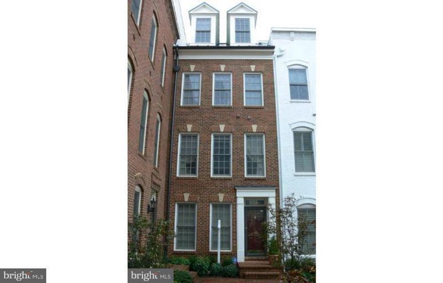 Discover the charm of this contemporary townhouse nestled in the desirable Potomac Greens community. Built in 2005, this beautifully maintained home features three spacious bedrooms and three and a half bathrooms, providing ample space for relaxation and entertaining. Step inside to find a gourmet kitchen that will inspire your culinary adventures. Complete with upgraded countertops, a breakfast area, and modern updated appliances including a  dishwasher, stove, refrigerator, and built-in microwave. The inviting dining area, adorned with elegant chair railings and crown moldings, sets the perfect stage for memorable meals with loved ones. The warm ambiance continues throughout the home with rich wood floors and a cozy fireplace, ideal for those chilly evenings. Enjoy the convenience of in-unit laundry and an attached rear-entry garage with space for two vehicles. The hot water heater has recently been upgraded too! Outside, the community offers a wealth of amenities, including a clubhouse with an outdoor pool, exercise room, tennis courts, and playgrounds, ensuring there's something for everyone to enjoy. The association fee covers essential services such as common area maintenance, sewer, and trash, allowing you to focus on what truly matters—making this house your home. Perfectly situated within a 10-15 minute drive to Ronald Reagan National Airport, Capitol Hill, The Pentagon, and vibrant downtown Arlington, this townhome combines comfort with unbeatable accessibility. Experience the perfect blend of comfort and convenience in Potomac Greens.