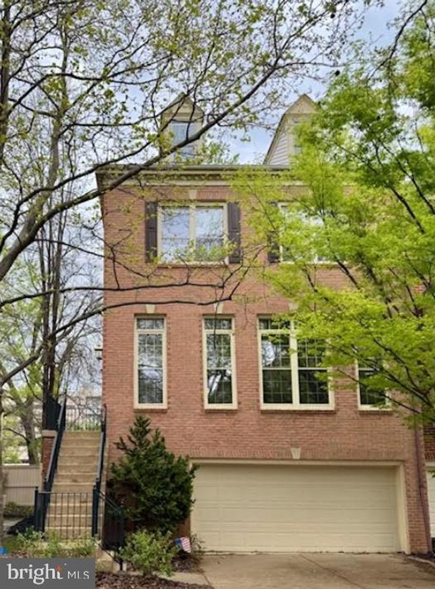 Welcome to 10518 James Wren Way, a distinguished brick end-unit townhome nestled in the sought-after Chancery Square community.  This residence offers a harmonious blend of classic architecture and modern amenities filled with natural light. 

Interior features:
Step inside to discover a spacious and light-filled interior, high ceilings and 3 levels of living space.  The beautiful property includes 3 bedrooms all finished with hardwood floors, 3 full bathrooms all with updated vanities, mirrors and lighting and a finished basement that offers versatile space, ideal for a home office, gym and recreation room and a half bath with storage. The main level is complete with gleaming hardwood floors,ceramic tile flooring, crown molding, chair railing & more. The incredibly spacious kitchen with a gourmet layout with a kitchen island, wood cabinets, granite counters, built-in bookshelves, kitchen table space and an open layout including a family room/sunroom. The main level also includes a formal dining room and formal living room filled with natural light. The lower level has tile floors and comfortable carpets, recessed lighting, high ceilings and French doors that walk out to the back yard. 

Exterior & Location Features:
Enjoy outdoor living on the private deck, or relaxing in your private back fenced-in patio, perfect for morning coffee or evening gathering.  An attached 2-car garage provides extra storage space.  Close to downtown Fairfax City, Chancery Square offers a close walk to several restaurants, cafes and shops.  Commuters will appreciate easy access to major routes, including I-66, Route 50, and the Vienna/Fairfax-GMU Metro station.  Walking trails and parks are nearby and easily accessible.  Don't miss the opportunity to see this fabulous property that combines comfort, style, and convenience in one of Fairfax's most desirable neighborhoods.  Schedule a tour today!