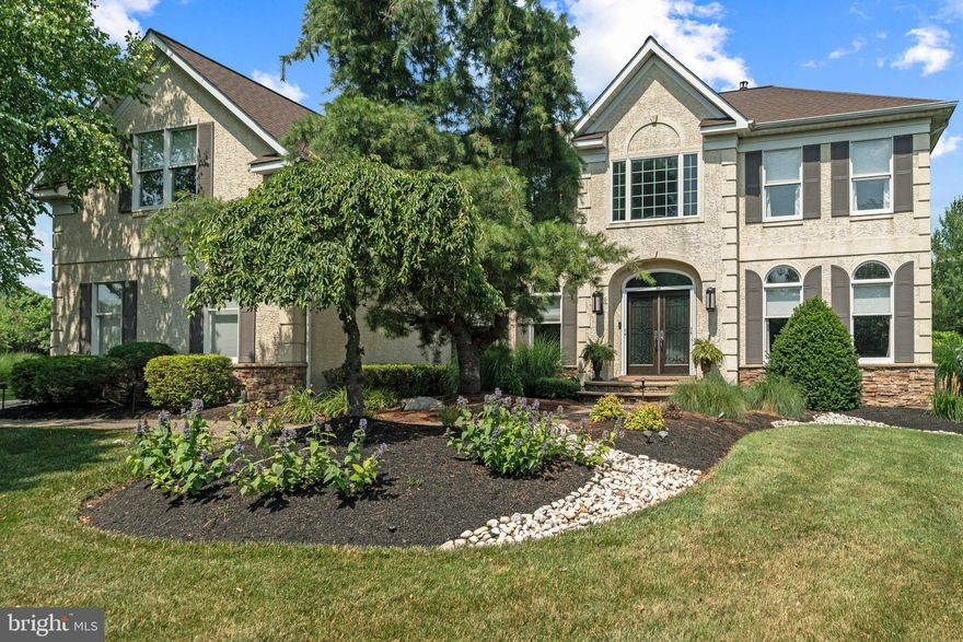 Welcome home to 8 Furlong Court, located on a quiet Cul de sac, in desirable Stoney Ford Estates.  This well maintained 5 bedroom 4.5 bathroom home in the Council Rock School District is ideal and ready for making lasting memories. This inviting residence boasts stunning curb appeal, with lush landscaping lining the front walkway with a decorative custom double-door glass entry to a 2-story foyer. You are warmly embraced with a unique tin ceiling and wood flooring that seamlessly connects the Living room and Dining room, both rooms have hand crafted coffered ceilings. The first floor Home Office provides a quiet working space overlooking the front yard. The updated Kitchen with expanded cabinetry, has a bump out sink, granite counters, center island and stainless steel appliances: Bosch dishwasher, Sub Zero refrigerator, built-in oven and Wolf Range. The Kitchen overlooks the spacious family room with a unique distressed 2-story wooden ceiling a stone gas fireplace and motorized blinds. The open floor plan is perfect for entertaining. There is a convenient second staircase. From the hallway upstairs, you have a spectacular overlook from the bridge down into the Family Room and Foyer.
 This home boasts a Primary Suite with 2 walk-in closets, a sitting area and luxurious en suite bathroom with soaking tub, enclosed shower, and dual vanity. There are 4 additional spacious bedrooms, another full updated hall bathroom and a Jack and Jill bathroom serviced between bedrooms 4 and 5. Attic access through the hall bedroom, equipped with a fan and ample storage space.
Off the Family room is the updated Laundry room with counter space and cabinets which leads you to a 3 car Garage with carriage house doors, side mounted openers including shelving, peg boards and motorized overhead storage system. Head to the outdoor oasis through double door sliders. The yard is lined with trees and an aluminum maintenance-free fence with 4 gates. The multi level travertine patio has an outdoor kitchen area with a DCS natural gas grill, perfect for entertaining. There is a large inground saltwater system spa with remote control, natural gas firepit and torches, low voltage landscape lighting throughout the property including wall and patio lighting. Underground sprinkler system is offered in the front and side yards. The well designed fully finished basement has an egress with double French doors that lead to the backyard.  There is a full bathroom, partitioned office or 6th bedroom, possibly an In-law suite, wet bar, wine refrigerator, bar refrigerator, dishwasher, game room and home theater area to cuddle up and watch movies.  French drain sump pump connected to the whole-home generator. Sonos amplifier connected to outside patio rock speakers. State of the art HVAC, 2 zones, dehumidifier and purifier.  
Don’t wait, this home is a rare find and an opportunity not to be missed!