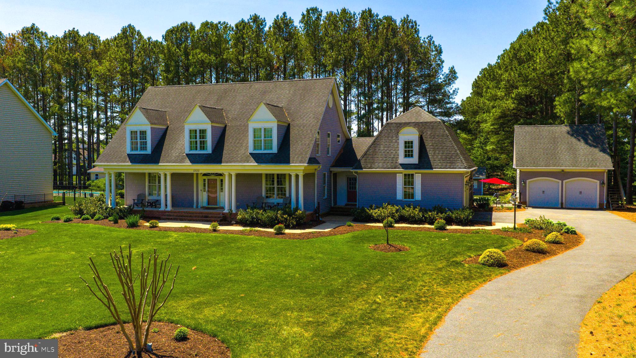 13532 RUSTLING OAKS DRIVE