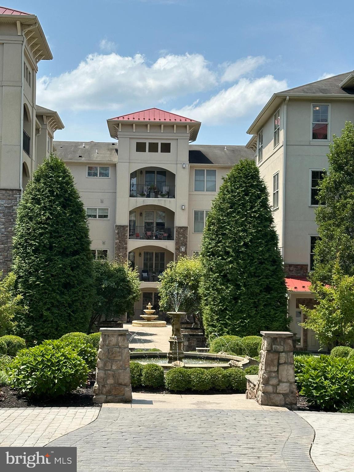 Welcome to Terrazza, a beautifully landscaped property with architecture reminiscent of an Italian villa. The sound of fountains greets you as you walk to the foyer of this handsome place. Unit 226 is a 2 bedroom 2 ½ bath + den which is 2004 square feet and larger than some other units. As you step into the condo you will see handsome, gleaming wood floors and light pouring in from the balcony. The coat closet is on your right and the powder room is on your left. As you walk through the property, to your right is the open dining area with fabulous book shelving nestled in the corner. The gracious living room adjoins the dining space and has a corner gas fireplace with TV anchored above. As you step from the living room area onto the balcony you can hear the fountains. How soothing this sound is and how charming the environment. This is a Western orientation so that the sunsets will enchant you. The European style kitchen has open shelving to show off your pottery, china and treasures you have collected from your travels. Stainless Steel high end appliances have features to make your life easier. The hood vents to the outside. A pantry gives you plenty of storage space. The high bar area is perfect for socializing with friends and family as you create from the kitchen. The laundry area is just outside of the kitchen. A den gives you that extra space to use as a guest room or a place for office or craft/painting activities The left hand bedroom has a spacious walk in closet and a storage closet. The ensuite bathroom is a walk in shower and double sink. As you walk back through to the other side of the property you will find the other primary bedroom. It has a nook that is perfect for reading or gazing out the double windows. There is a marvelous closet ready for shoes and boots as well as a large walk in closet. The ensuite bathroom has an oversized soaking tub, a walk-in shower, double sinks, linen closet and a towel warmer! This property has amenities that will make you think you are at a resort. There is beautiful clubhouse, outdoor pool, the fitness center, locker room, library, tennis/pickleboard courts, and meeting room. This location just below West Chester Pike and off Rte 252 makes it easy to get to King of Prussia, the airport, arboretums and museums close by. The shopping and restaurants nearby at Newtown Square’s Ellis Preserve offer a myriad of choices. HVAC was installed in November of 2023. One parking space and storage closet come with the unit. Monthly fee of $724 includes a parking space and a storage locker. Move in fee is $500 + a $500 refundable security deposit. The capital contribution is $3000. Sewage is billed separately. Camco Setup fee is $100 due at settlement. No assessment for new roofs currently being installed. Come live in and enjoy this gorgeous property where you will feel like you are on vacation every day.