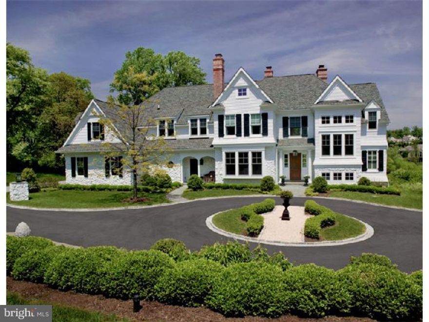 With breathtaking views of the 170 acre Water Mills Preserve, this beautifully designed custom home is ideally sited at the end of a quiet cul-de-ac in the Main Line suburb of Philadelphia.  The interior of the home allows a natural flow for large scale entertaining, combining high levels of luxury and comfortable family living with state-of-the-art entertainment areas.  An award winning floor plan features 8,600 square feet of living space enriched by a dramatic staircase, ten foot high ceilings, coffered & vaulted ceilings, graciously proportioned rooms, oversized windows, 4 fireplaces, cherry hardwood flooring, an abundance of natural light throughout & panoramic views from every room. There is an incredible master suite with a vaulted beamed ceiling, palladium window,separate his and her marble bathrooms & walk in closets, a built-in entertainment center and an exterior balcony; a state-of -the-art kitchen anchored by a grand center island, adjoining breakfast room with a palladium window & vaulted ceiling; a family room that is the heart of the home with a coffered ceiling, exquisite fireplace, & French doors that open to the flagstone terraces; a spacious wainscoted dining room with a paneled fireplace & adjoining butler's pantry; a handsome library with paneled cabinetry and a fireplace with marble surround; an open staircase to the walk-out lower level with an entertainment/media area, an exercise room, a sauna & a full bath. The exterior is distinguished by a winding, tree lined driveway that opens to a very private and beautiful home embraced by specimen plantings, charming stone walls, spacious awning covered terraces overlooking the heated swimming pool & idyllic grounds.