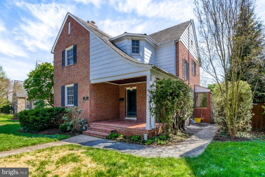 Welcome to 211 E Lake Avenue, a timeless Cedarcroft Tudor-style colonial home with a traditional, but open floor plan. This home masterfully blends classic architectural charm with modern sophistication. The layout showcases original hardwood floors, rich wood trim, and elegant living spaces designed for both everyday comfort and larger gatherings. The living room flows seamlessly into a formal dining room, creating an inviting setting for friends and family.

At the heart of the home, the spacious kitchen is beautifully appointed with granite countertops, custom cherry cabinetry, and direct access to the outdoor living area—perfect for effortless indoor-outdoor entertainment. A convenient main-level powder room completes this thoughtfully designed first floor.

Upstairs, retreat to an expansive primary bedroom with abundant natural light and two closets including a walk-in. The top floor has two additional well-sized bedrooms and a full hallway bath. Attic access provides additional storage. The fully finished, professionally waterproofed lower level adds exceptional versatility, offering a private 4th bedroom for guests, ¾ bathroom with shower stall, additional non-conforming bedroom for a dedicated office or flex space, and a comfortable family room—ideal for a media space, extended stays, or work-from-home living.

Step outside to a beautifully landscaped, level, and fully fenced private yard, where a large patio creates the perfect backdrop for entertaining or quiet relaxation. A healthy fruit bearing fig treat provides a delightful and delicious addition. Sellers have made great jam from the fruit. Ideally situated near local shops, grocery stores, dining, and commuter routes, 211 E Lake Avenue represents a rare blend of space, character, and opportunity. Come take a look and make it your new home.