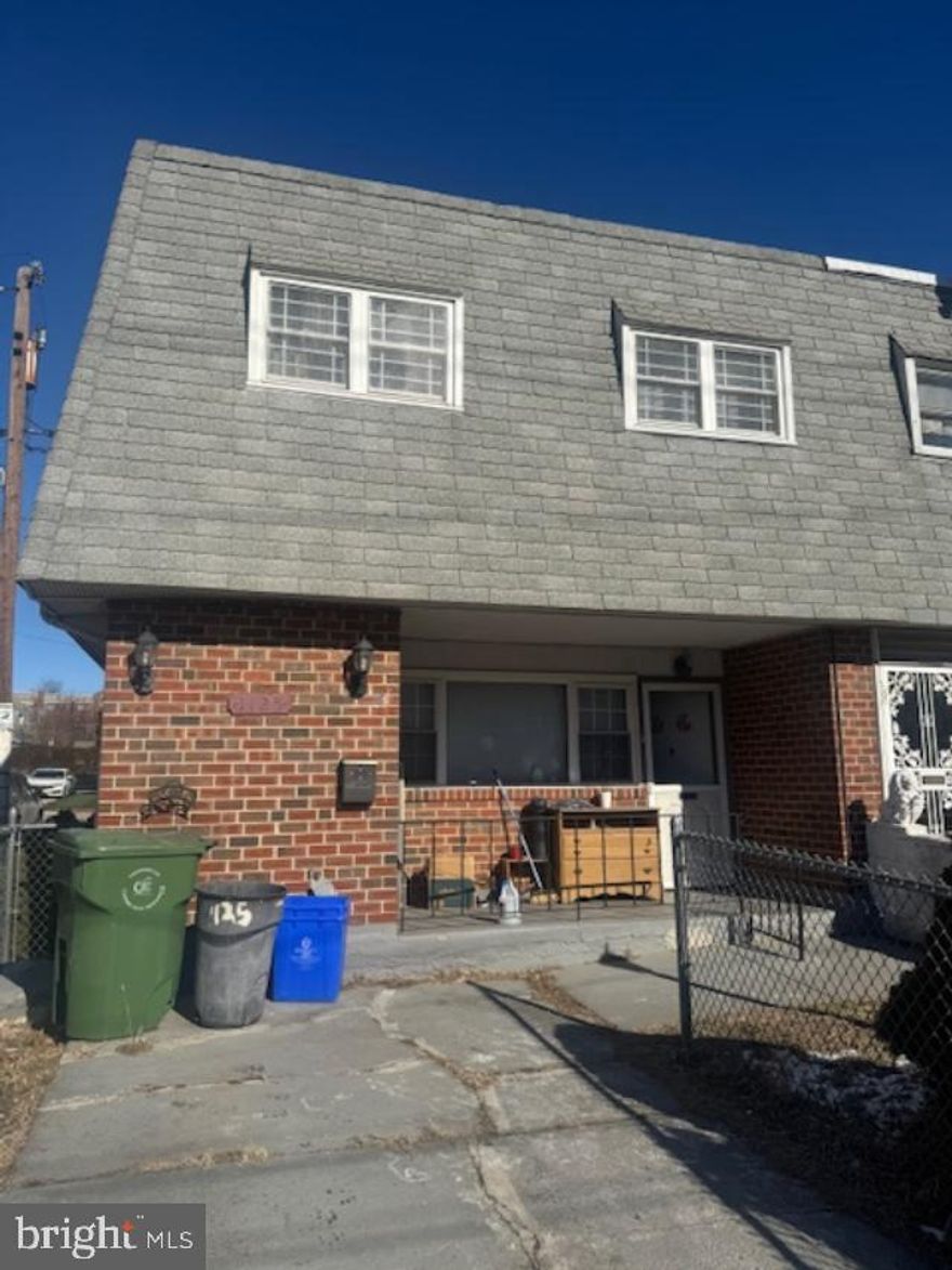 PRICE REDUCED!!  CALLING INVESTORS !   Perfect cash flowing property for investors looking for an income producing property from student housing OR purchase for your child and have his/her roommates pay rent to cover your child's board.  Move in Ready 4 bedroom 2 full bath end unit row walking distance from Temple University!  Property is an excellent cash flowing property!  Property was prior occupied by Temple University students.  Walk in through front door and into main living area with laminated plank flooring.  Updated kitchen with beautiful cherry cabinets, stainless steel appliances, granite counter tops, tile back splash and ceramic tile flooring.  Off kitchen is a full updated bathroom with laundry and stall shower.  Also walk out back door off kitchen into fenced in back yard with storage shed.  Walk upstairs to 4 bedrooms and full hall bathroom with dual sinks.  Property is equipped with gas forced air heat and central air.  Motivated Seller!!  Make your offer today !