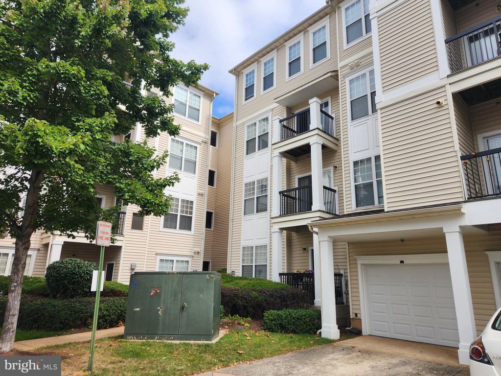 Photo of 11319 Aristotle Drive #3-106, FAIRFAX, VA 22030 (MLS # VAFX2268738)