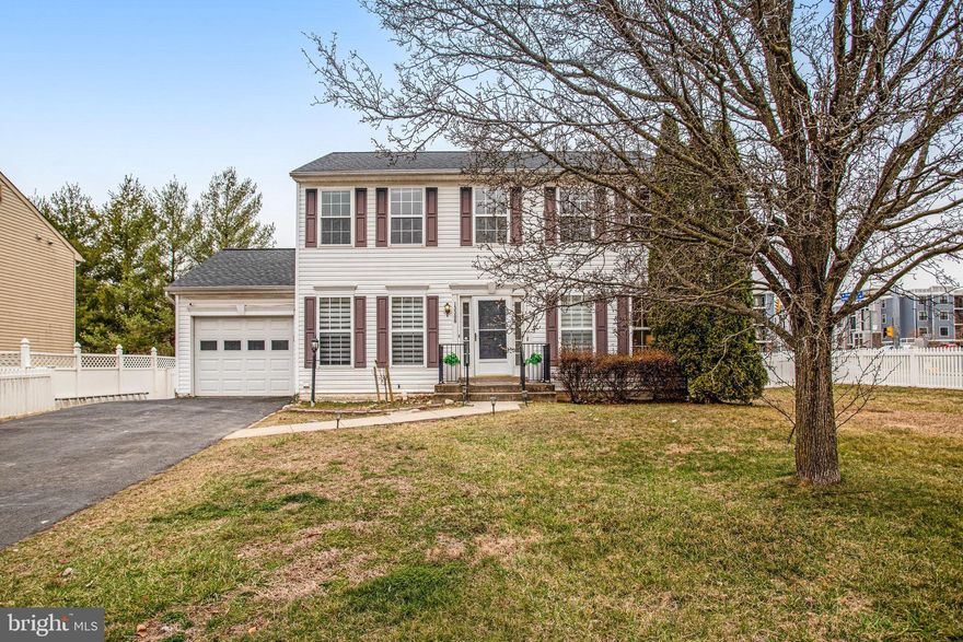 Move-In Ready Gem! This beautifully renovated 3-bedroom, 3.5-bath home in Dale City features a bonus fourth bedroom in the walk-up basement and an attached garage. No HOA and owned by a single owner! Stunning updates include refinished hardwood flooring on the upper levels, LVP in the basement, an upgraded kitchen with brand-new countertops, and fresh paint throughout, new remodeled bathrooms on the upper levels. Major system upgrades include a new roof (2023), HVAC and water heater (2018), refrigerator and washer/dryer (2021), and stove (2022). The spacious layout extends to a large, fenced-in backyard—perfect for outdoor entertaining. Conveniently located near schools, parks, and shopping, walking distance to Waterworks Waterpark... this home is a must-see!