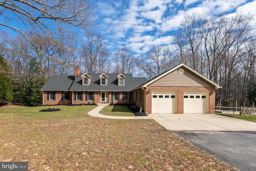 Beautiful brick cape cod on over 5 acres of privacy right outside the town of LaPlata.This home features 3 bedrms w/main level master & an additional room on the main level that can be used as a 4th bedroom. Family rm w/wood burning fireplace & built in shelving, separate dining rm, kitchen w/new stainless steel appliances just installed Jan '18, separate laundry/mudroom on main level.New Roof '12