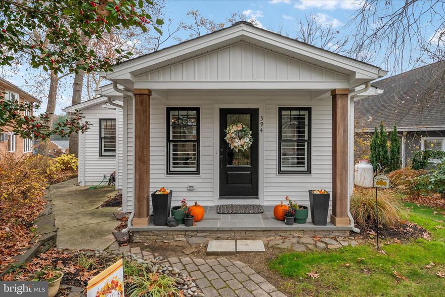Wake up to expansive views of the Magothy River from this completely renovated Coastal Cottage in the Severna Park community of Magothy Beach!    Deep water (8' +MLW) with boat lift on updated pier,   Step inside to discover the water views from both levels,   Open layout offers a great room with gas fireplace for the upcoming chilly weather, a chef's dream kitchen with abundance of cabinetry, quartz countertop, tiled backsplash & deluxe s/s appliances including 5 burner gas stove and 9' island for ample seating plus separate dining room with custom lighting,  Sliders lead to waterside deck  for relaxing while taking in the tranquil view, that steps down to custom patio for additional dining/grilling & entertaining space, Two bedrooms with custom details and two luxuriant bathrooms with tiled showers/baths , HVAC is electric with propane gas backup (1 yr), Architectural roof (1 yr), Windows & doors (1) LPV throughout  with exception of custom-tiled bathrooms , Lower level boasts an oversized family room  for additional gathering and entertaining space, a bar/entertaining area and half bath (with RI full bath connection should you wish to reconvert back to full bath).   Ample storage in the unfinished portion of LL as well as two outdoor storage outbuildings including a shed and waterside storage for your toys or equipment, Lawn sprinklers on waterfront side, Public water/sewer, Severna Park school district, Flood insurance not required, HOA paid as part of taxes